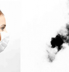 Mujer con mascarilla y contaminación